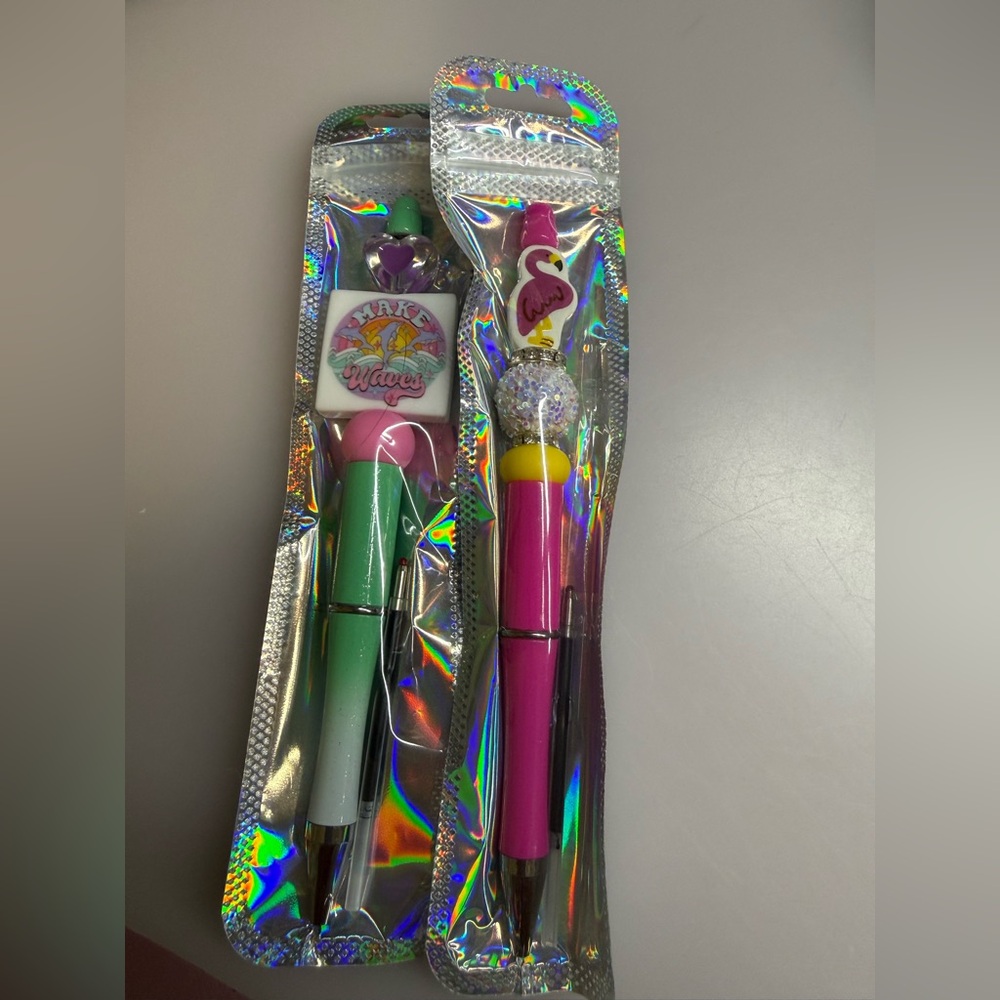 Beaded pens beach, and Flamingo